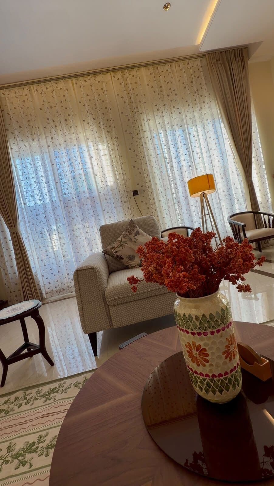 Curtains matched to a living room rug